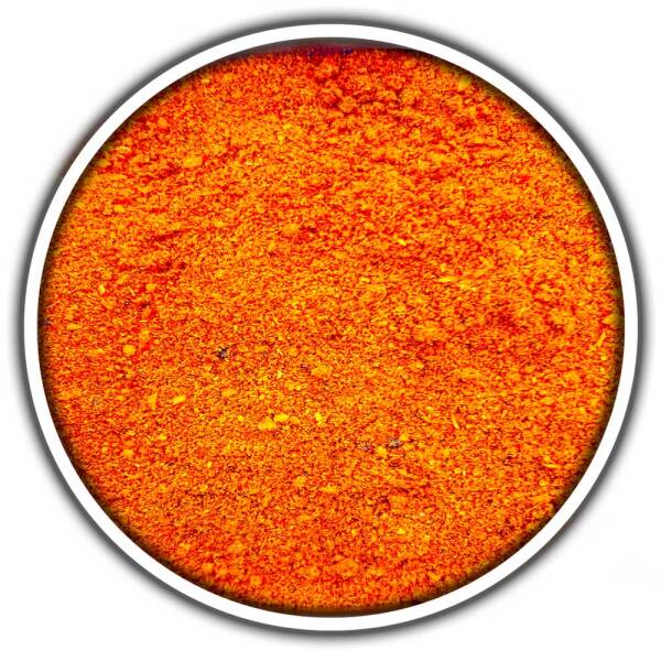 Tajine Gewürz in Nahaufnahme – feine Mischung aus Paprika, Cumin, Kurkuma und weiteren typischen Gewürzen